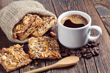 Coffee and cookies with different nuts