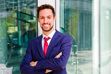 Portrait of an handsome businessman outdoor