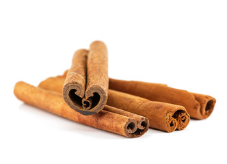 Cinnamon sticks isolated on white background