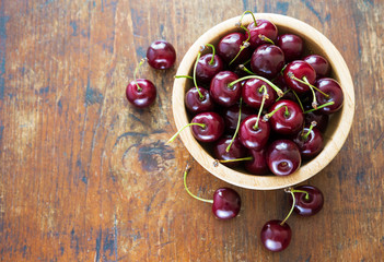 Fresh red cherries in bowl