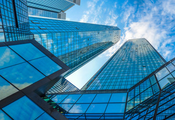 Obraz premium Modern skyscrapers in business district with blue sky