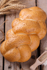 Challah bread with sesame seeds. Pastry,flour and sesame seeds.selective focus.Copy space.