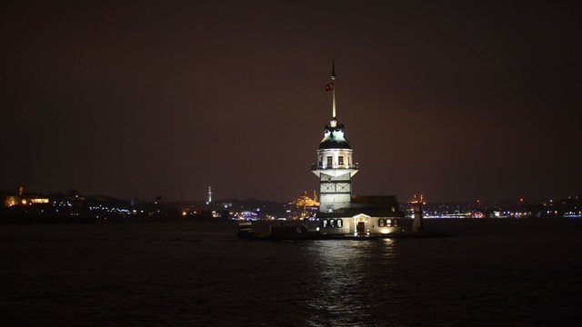 Maiden's Tower or Kız Kulesi in Turkish, also known as Leander's Tower (Tower of Leandros in the Bosphorus in Turkey at night.