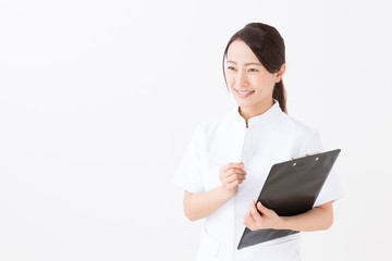 portrait of asian nurse on white background