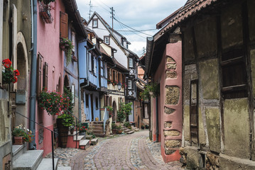 Street with half-timbered medieval houses in Eguisheim village