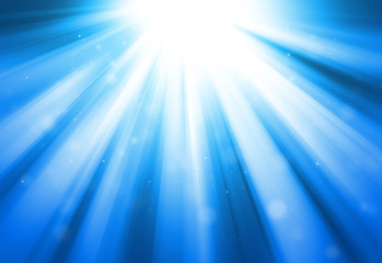 Blue glitter sparkle defocused rays lights bokeh abstract background.