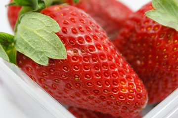 Strawberries in plastic box