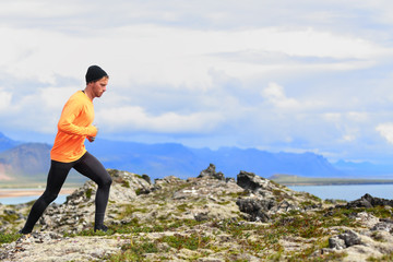 Running sport man in cross country trail run