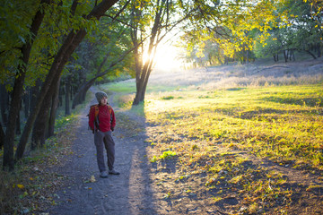 Fototapeta premium The girl with the backpack.