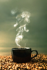 vintage and retro color tone of warm black cup of coffee on  roa