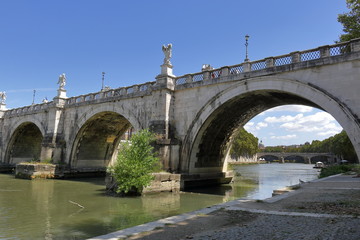 Fototapeta premium Arches of the brige Ponte Sant'Angelo in Rome, Italy