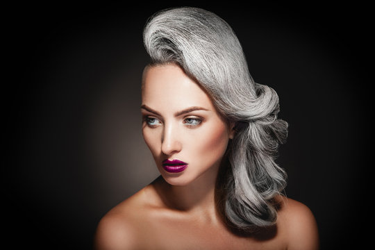 Young Woman With Grey Hair Color And Beautiful Makeup In Studio