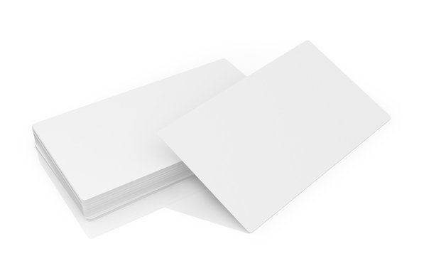Stack of white business cards on a white background.