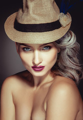 Portrait of cute woman with beuatiful makeup and stylish hat