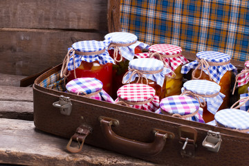 Canned fruits and vegetables in jars.