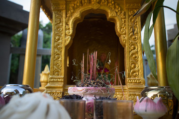 Burnt out Incense stick on a House Shrine in Southeast Asia