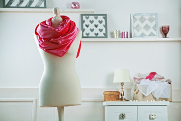 Mannequin with cloth in room