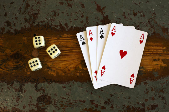 cards '4 aces' and dice