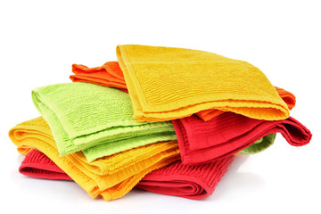 Colorful towels isolated on white