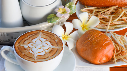 Cafe with sweet bun for breakfast