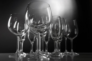 Empty wine glasses on gray background