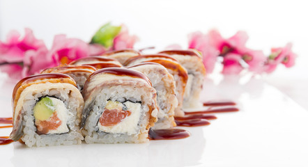 Eel sushi roll on a white plate