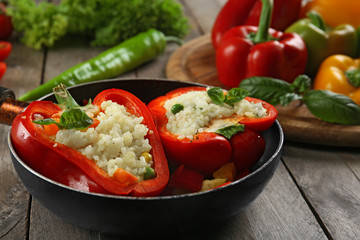 Stuffed peppers with vegetables on table close up