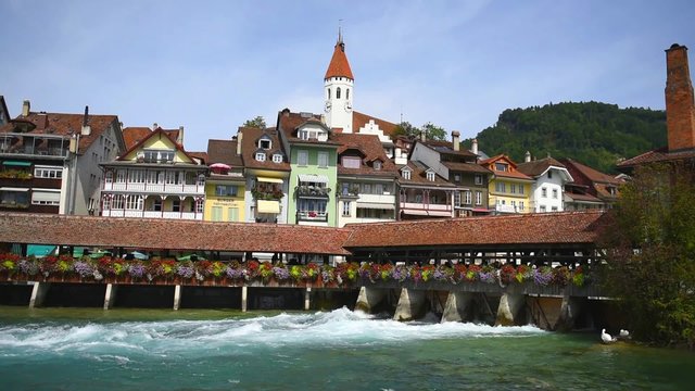 Bridge with a water gate in Thun town in Switzerland