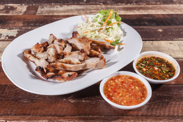 grilling pork in local market