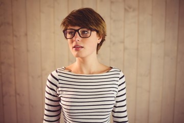 Young woman wearing striped clothes posing