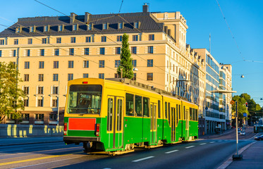 Fototapeta na wymiar Tram on the Long Bridge in Helsinki - Finland