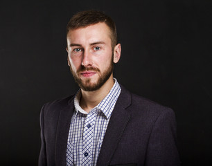 Business men portrait on a dark background