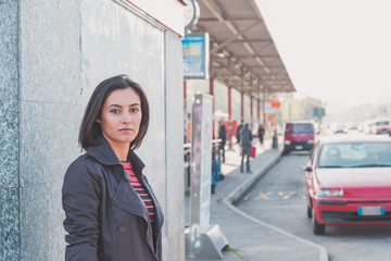 Beautiful girl posing in an urban context