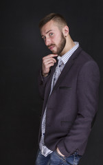 Business men portrait on a dark background