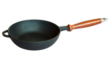 Frying cast-iron skillet isolated on white background