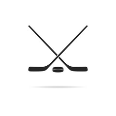 Icon hockey, two sticks and puck.