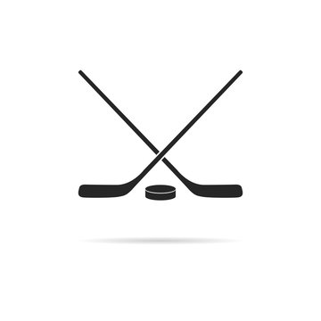 Icon hockey, two sticks and puck.