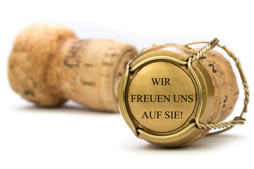 Wir freuen Uns auf Sie! Champagnerkorken