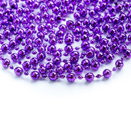 Purple beads garland isolated on white