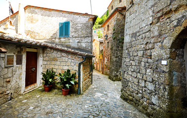Fototapeta na wymiar Lovely colorful streets small town in Tuscany, Italy