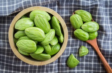 Parkia speciosa in wooden bowl
