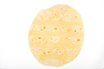 homemade wheat  mexican tortilla on white