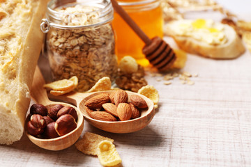 Healthy breakfast with bread, honey, nuts. Country breakfast concept