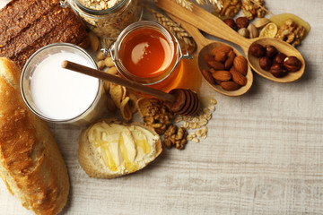 Healthy breakfast with bread, honey, nuts. Country breakfast concept