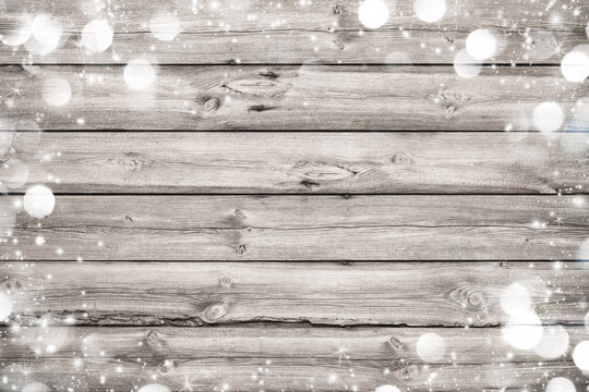 Christmas frame on wooden background