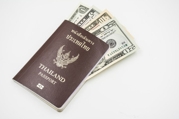 us dollar banknote with Thailand passport on white background..