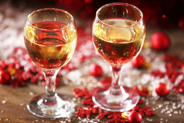 Champagne and Christmas decoration on wooden table