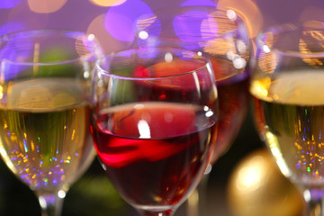 Wine and Christmas decoration on bright background