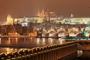 Fototapeta na wymiar Night Prague gothic Castle with Charles Bridge, Czech Republic