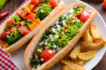 Hot dogs served on plate closeup